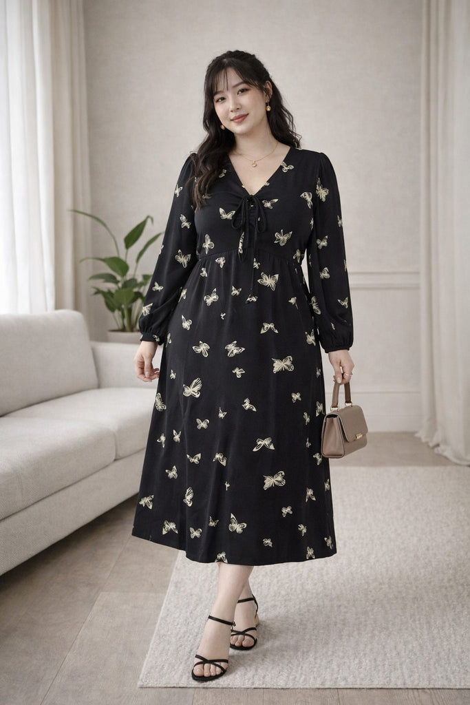 plus size black long sleeve midi dress butterfly pattern front view
