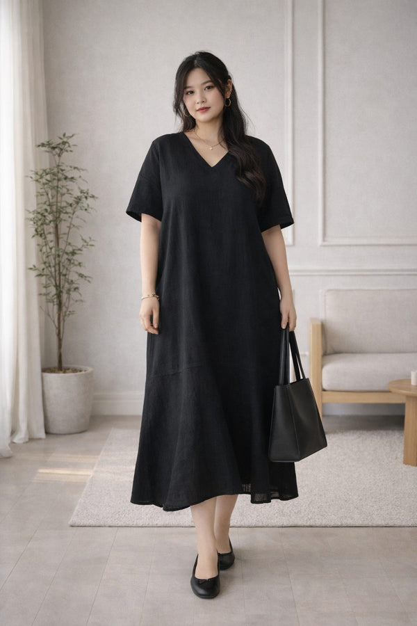 plus size black midi dress drop hem loose fit front view