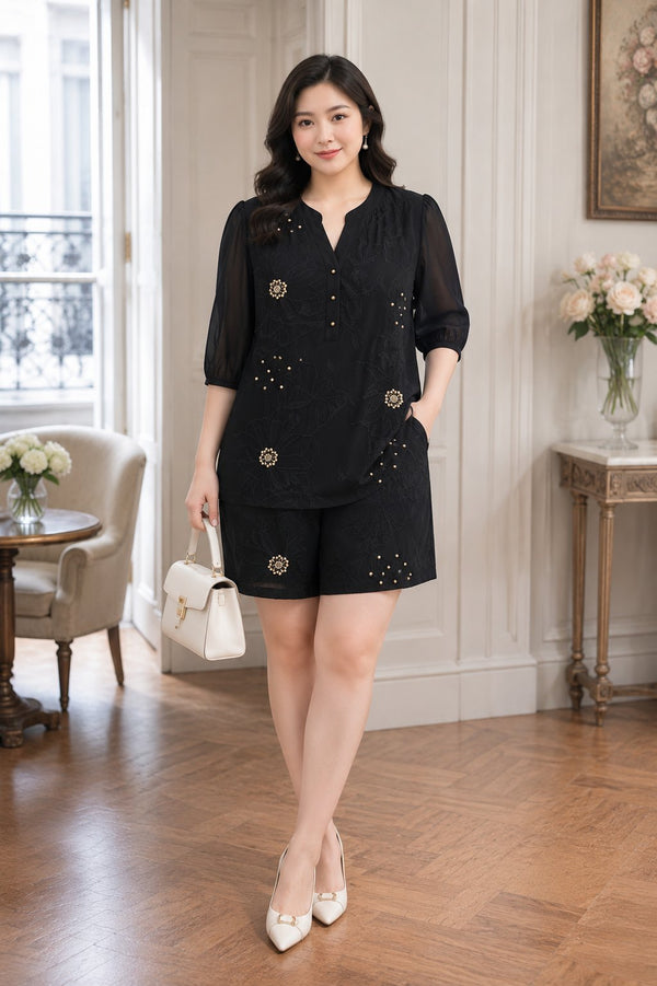 Plus size black embroidered blouse and matching shorts two-piece set front view