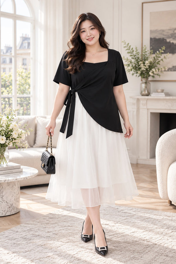 Plus size black and white square neck midi dress with flowing skirt