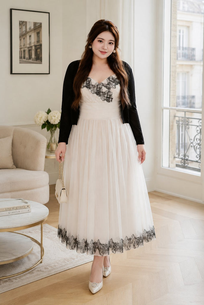 Plus size cream tulle midi dress with black cardigan front view