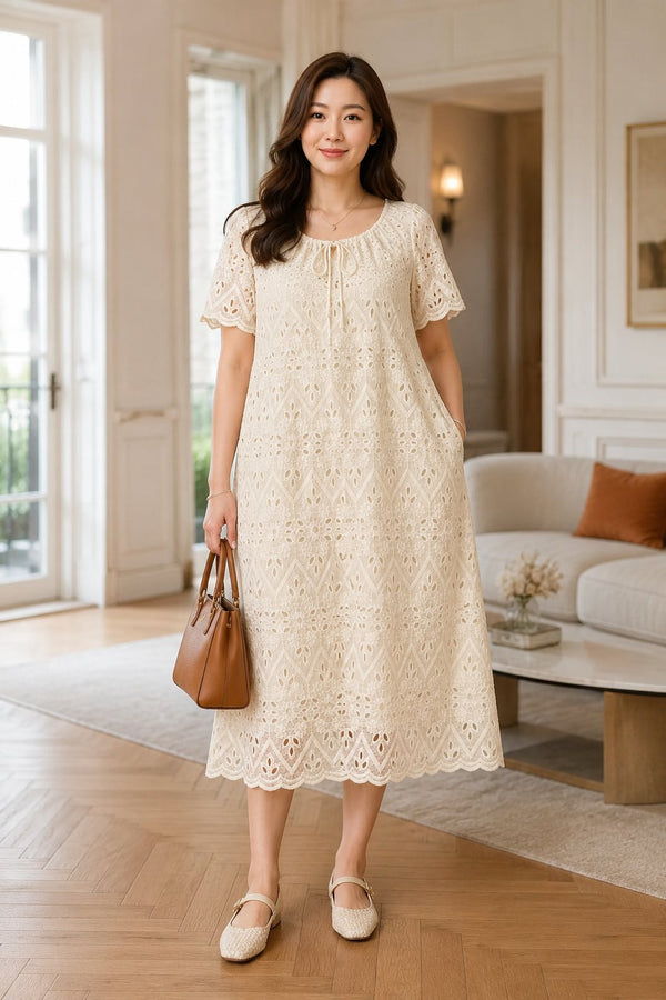 Plus size embroidered lace short sleeve shift dress with pockets in white front view
