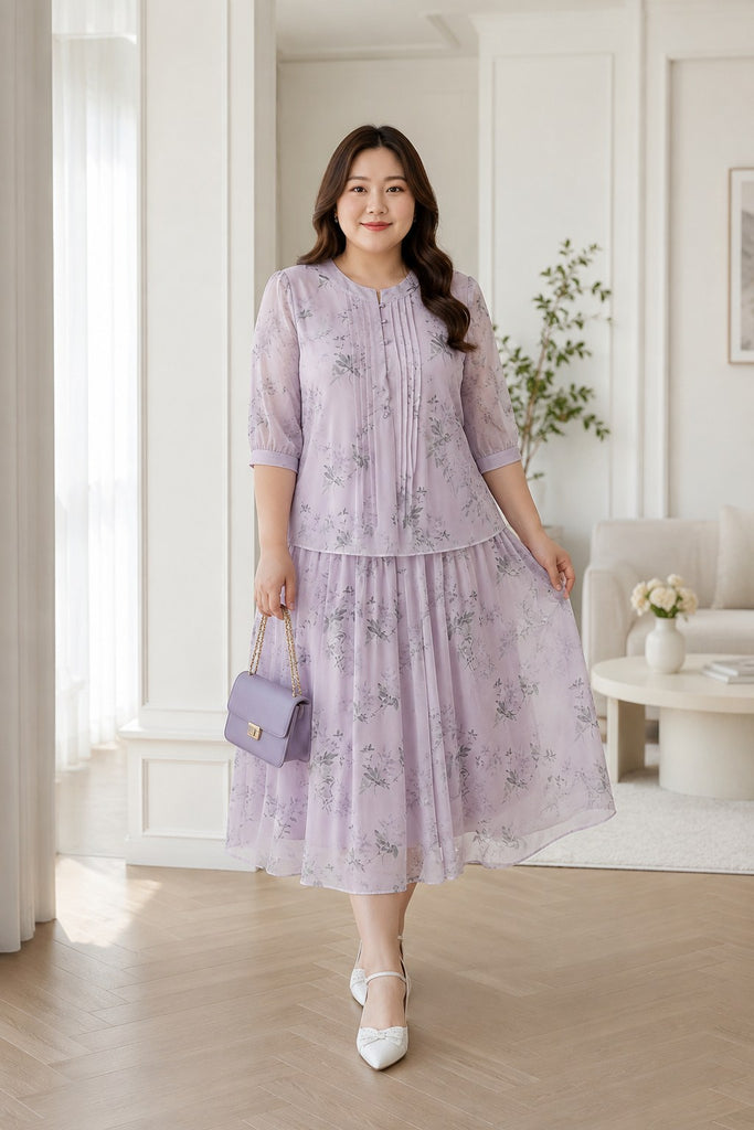 Plus size floral chiffon blouse and midi skirt set in lavender front view on model