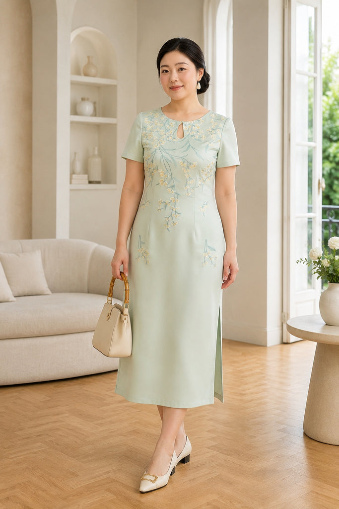 Plus size pastel green embroidered modern qipao dress front view