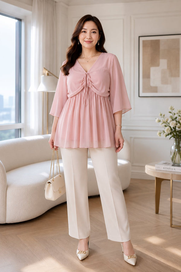 Plus size pastel pink chiffon tunic top with V neck and front tie detail