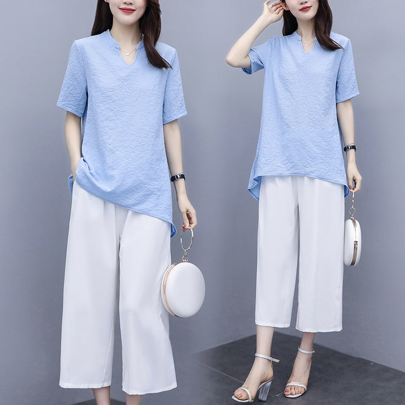 Plus Size Pastel Blue V Neck Longer Back Short Sleeve Top And White Culottes Pants Set