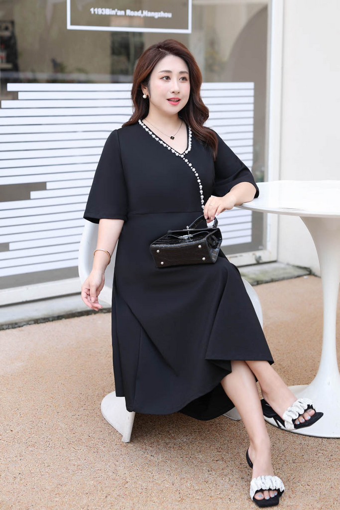 wrapped black pearl dress Darling Dress  Black Pearl  Eva Franco